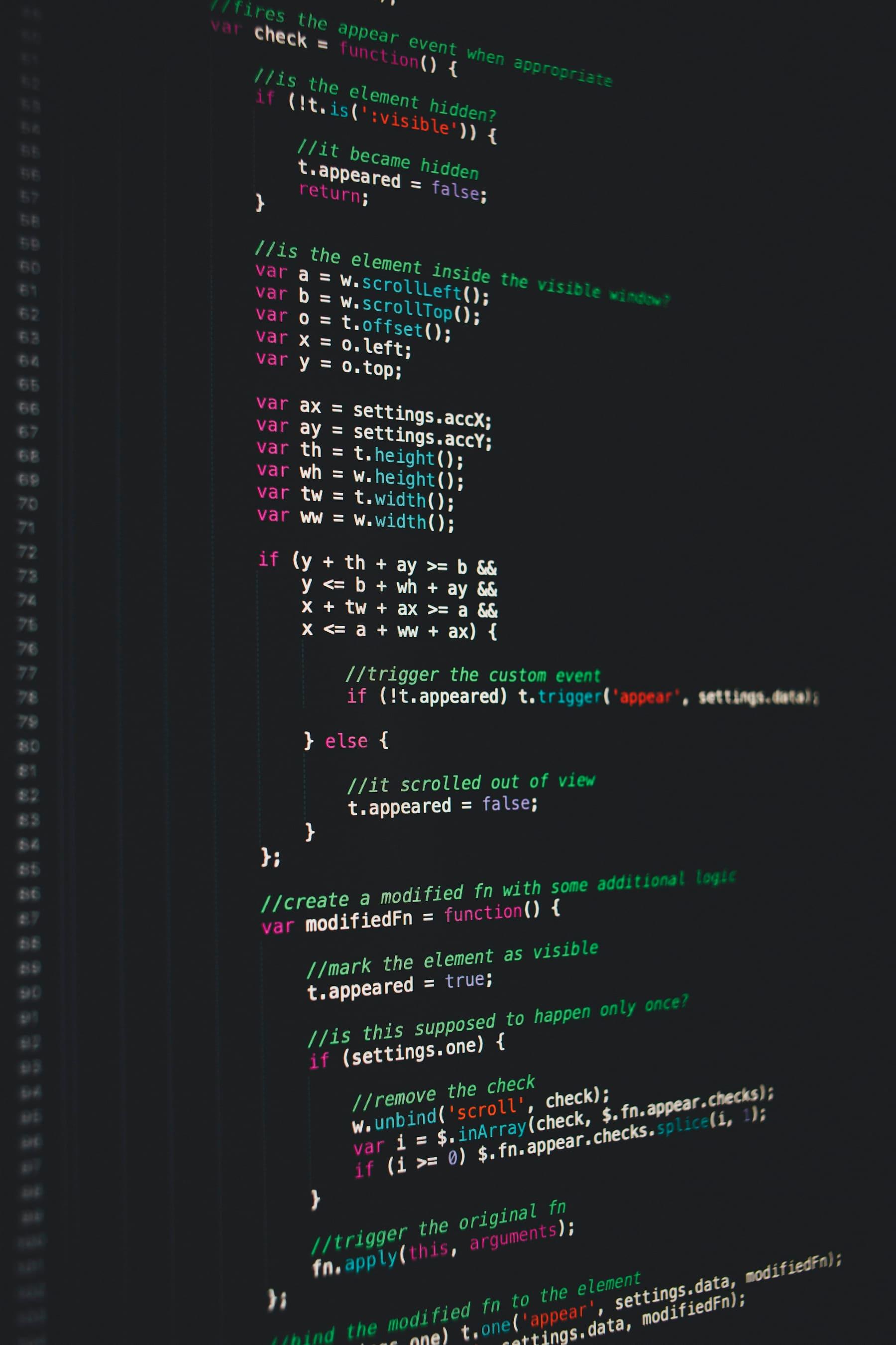 A builder working through a diff at a quiet desk — review gate before merge.